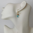 Kolczyki kwarc błękitny opleciony techniką wire wrapping pozłacane srebro