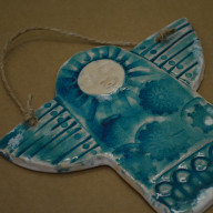 Anioł księżycowy. Ceramiczna płaskorzeźba